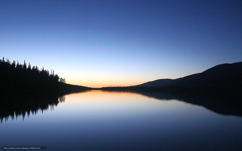 Silhouetted Trees and Mountains — Blue, Serene, Sunset, Photograph