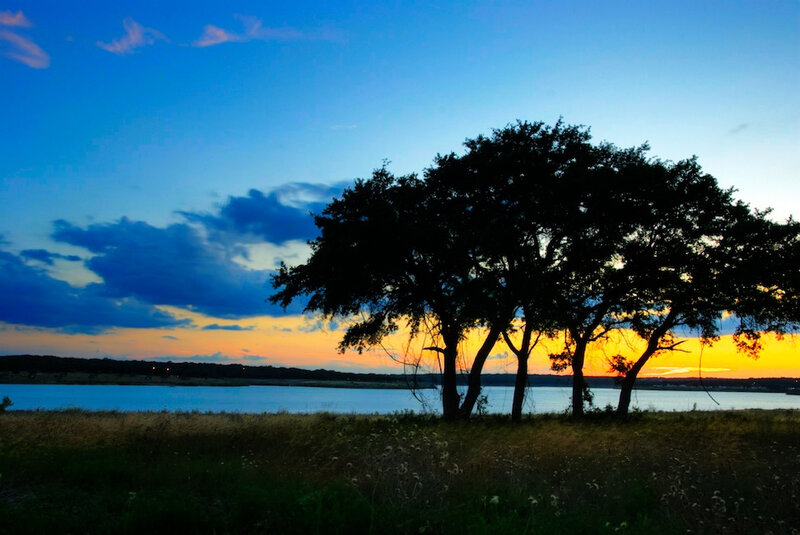 Silhouetted Trees at Sunset — Blue, Serene, Photograph, Lake