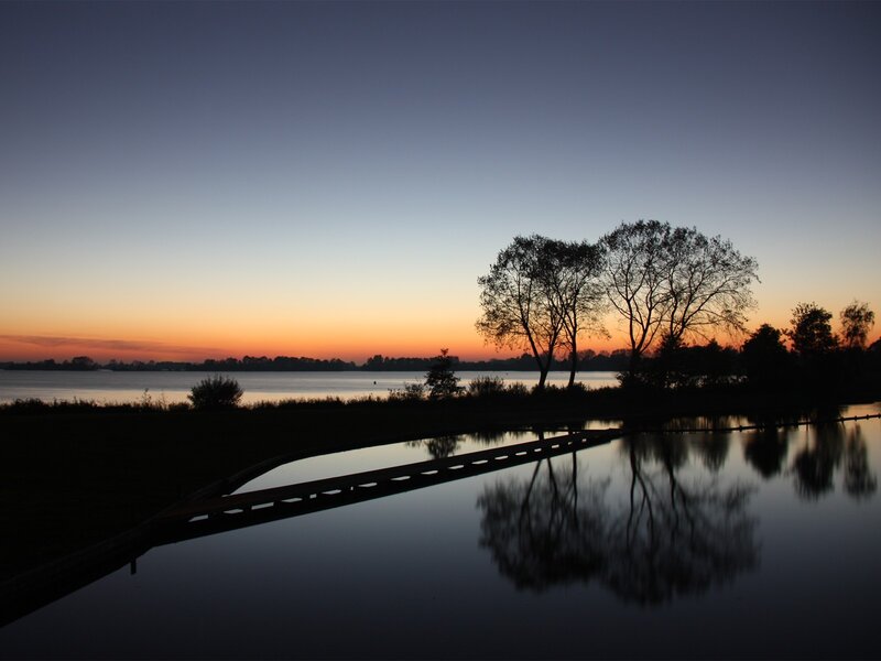 Silhouetted Trees at Sunset — Orange, Serene, Photograph, Water, Sky, Dock
