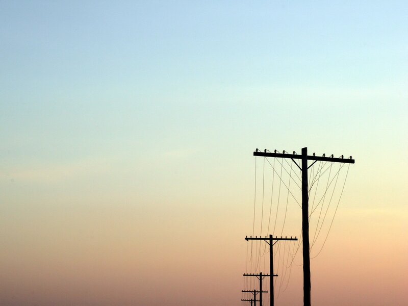 Silhouetted Utility Poles — Blue, Serene
