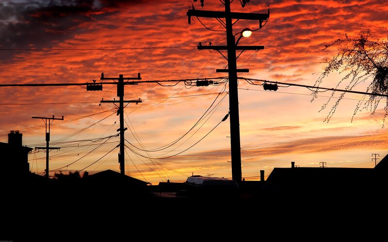 Silhouetted Utility Poles — Orange, Dramatic, Sunset, Photograph, Power Lines, Clouds