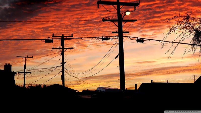 Silhouetted Utility Poles — Orange, Dramatic, Sunset, Photograph