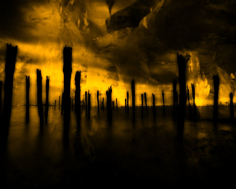 Silhouetted Wooden Posts — Yellow