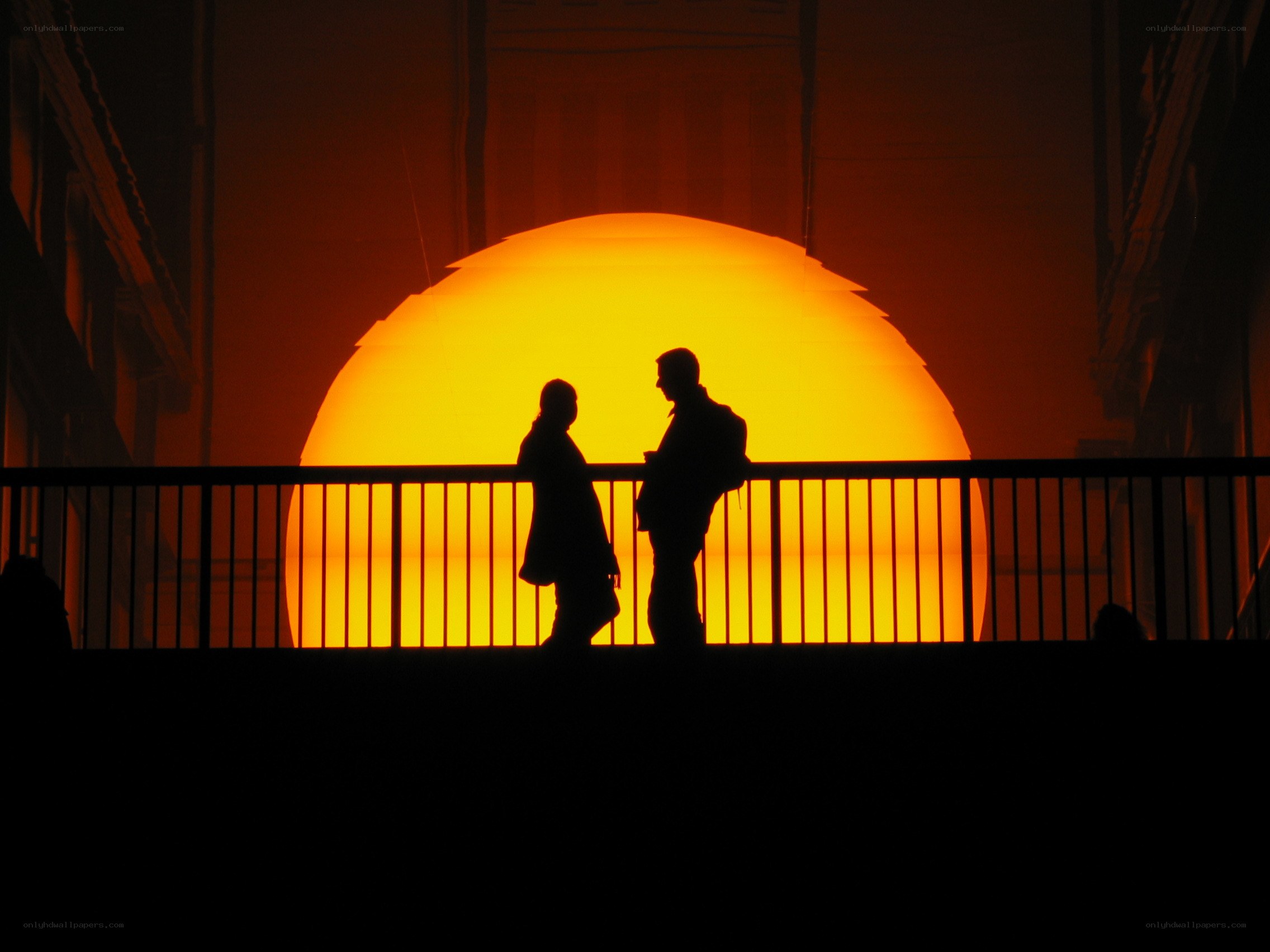 Silhouettes against a glowing sun