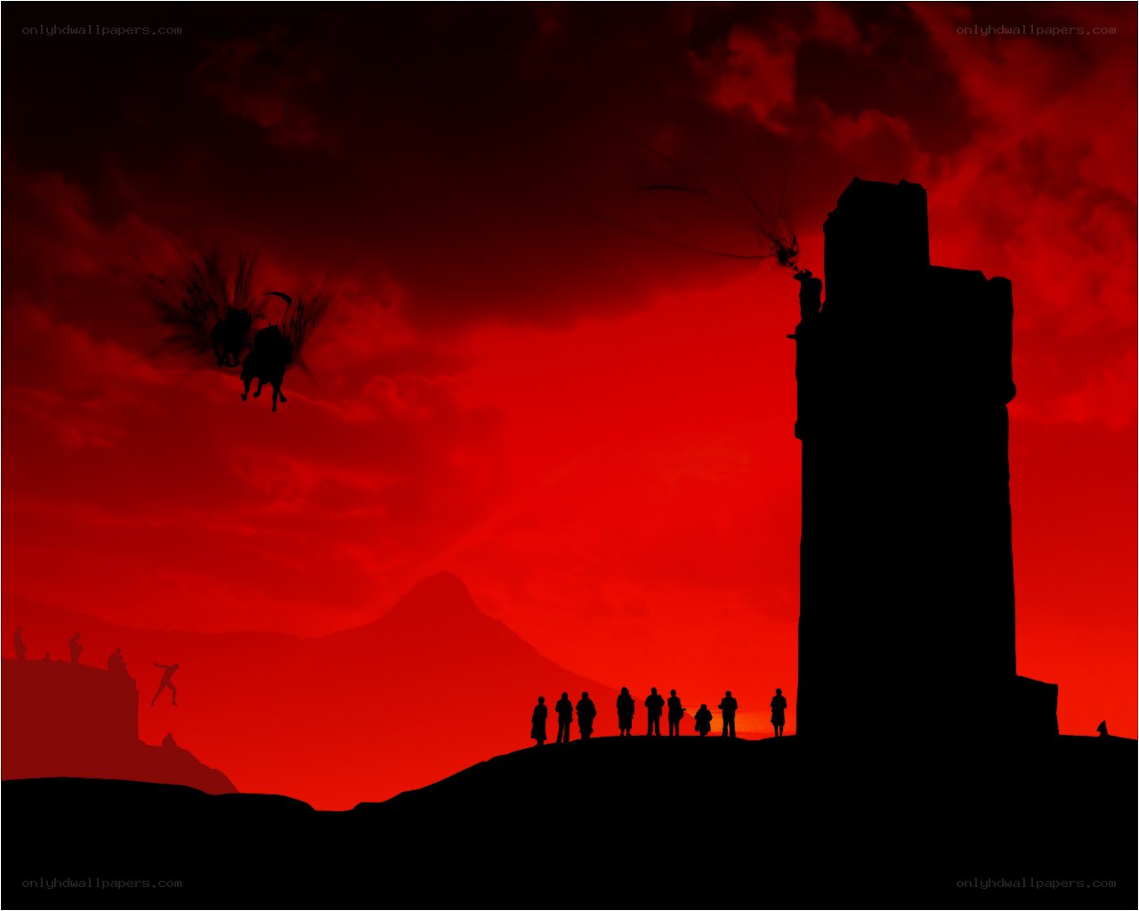 Silhouettes against a red sky