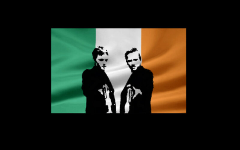 silhouettes against Irish flag