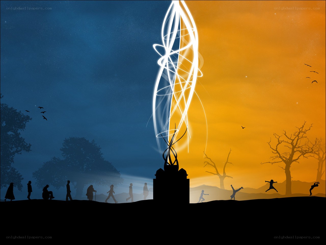 Silhouettes at a glowing monument