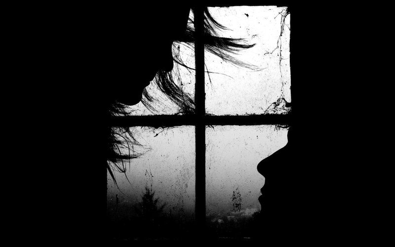 Silhouettes at a window