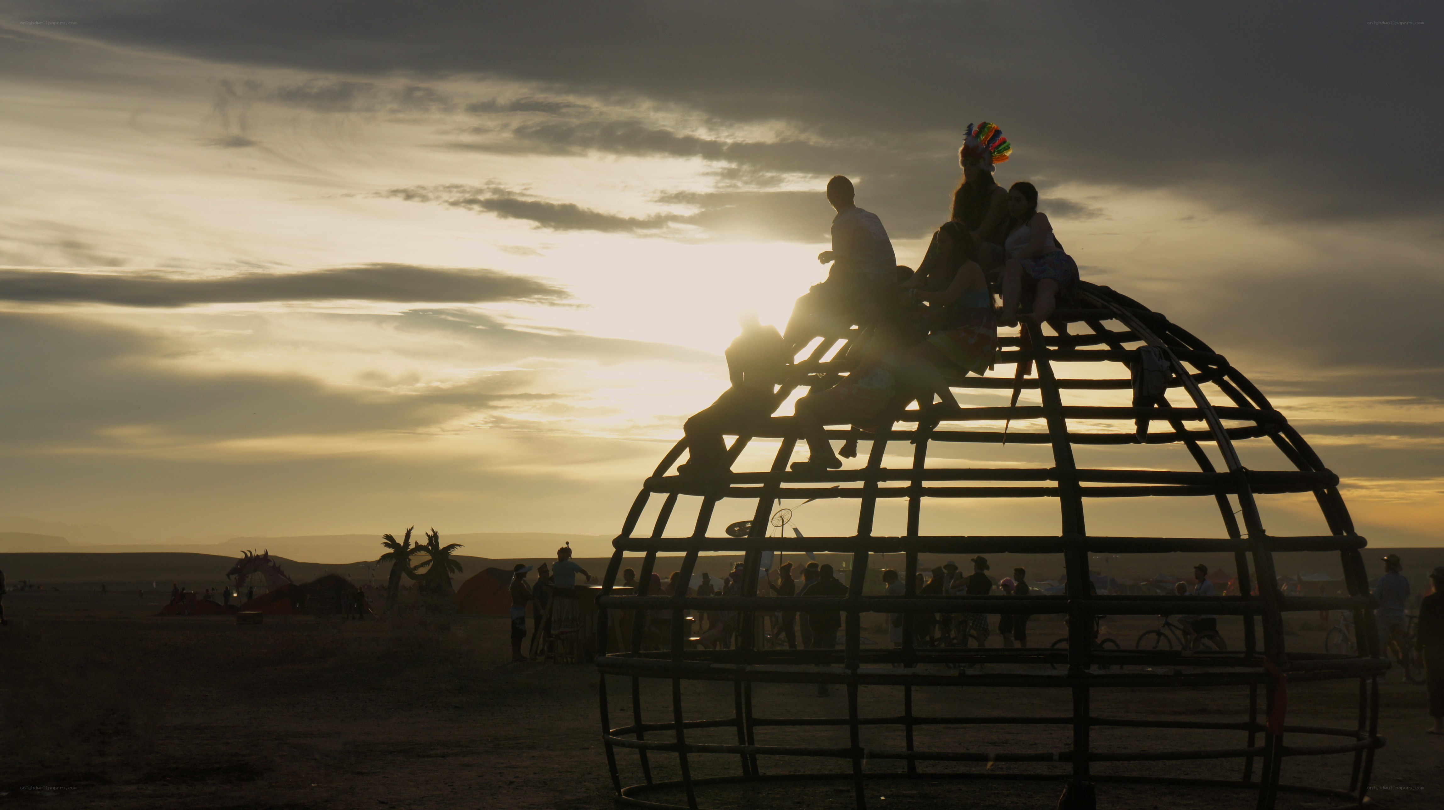 Silhouettes at festival sunset