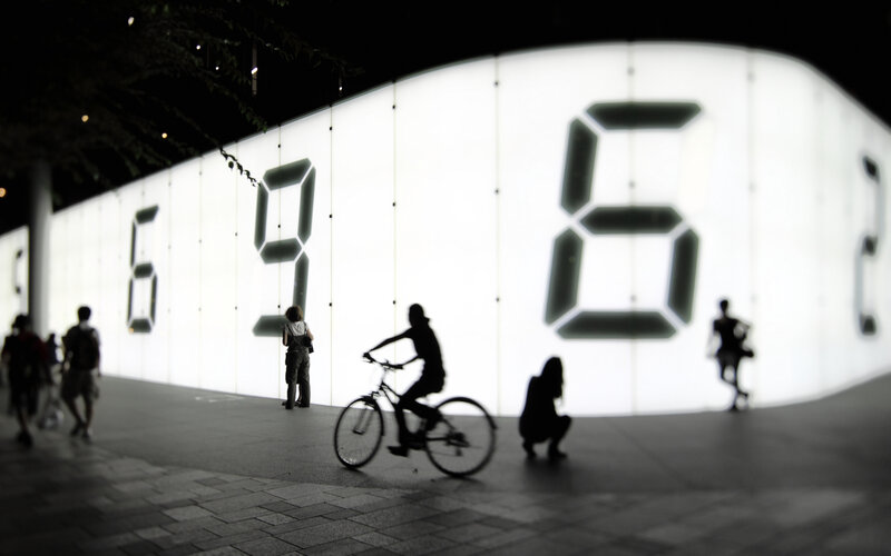 Silhouettes at Night with Digital Clock