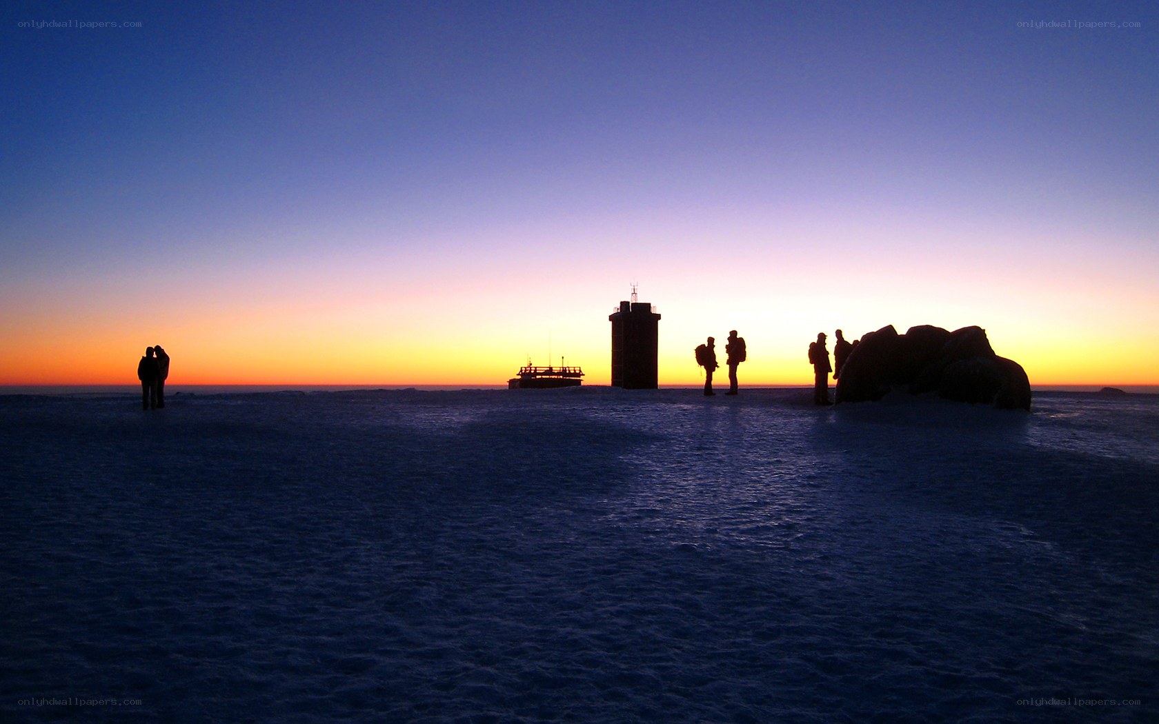 Silhouettes at polar sunrise