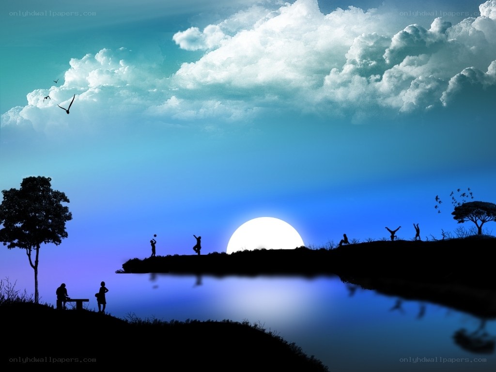 Silhouettes at sunset by the lake