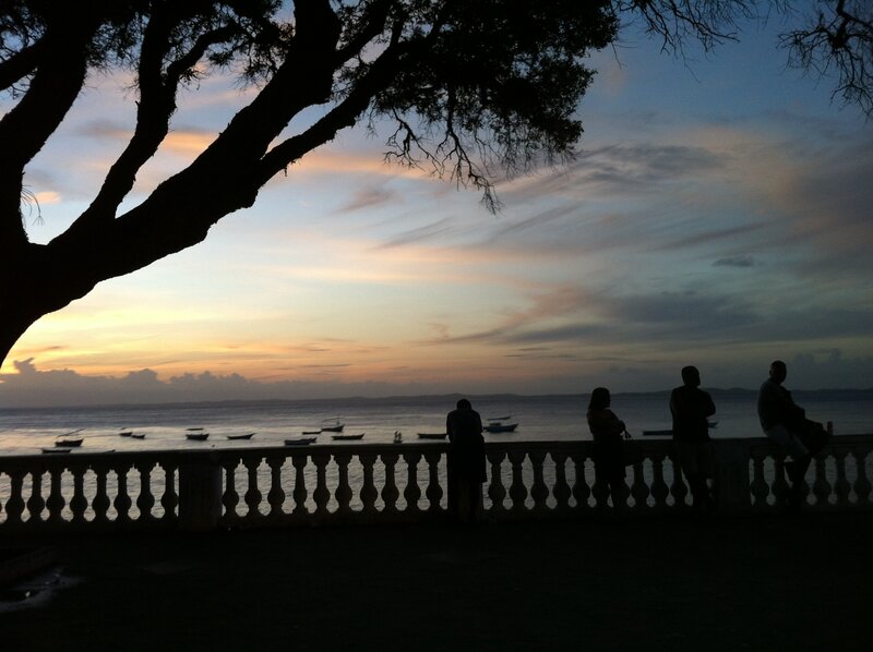 Silhouettes at sunset by the sea