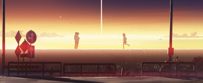 Silhouettes at sunset by the sea