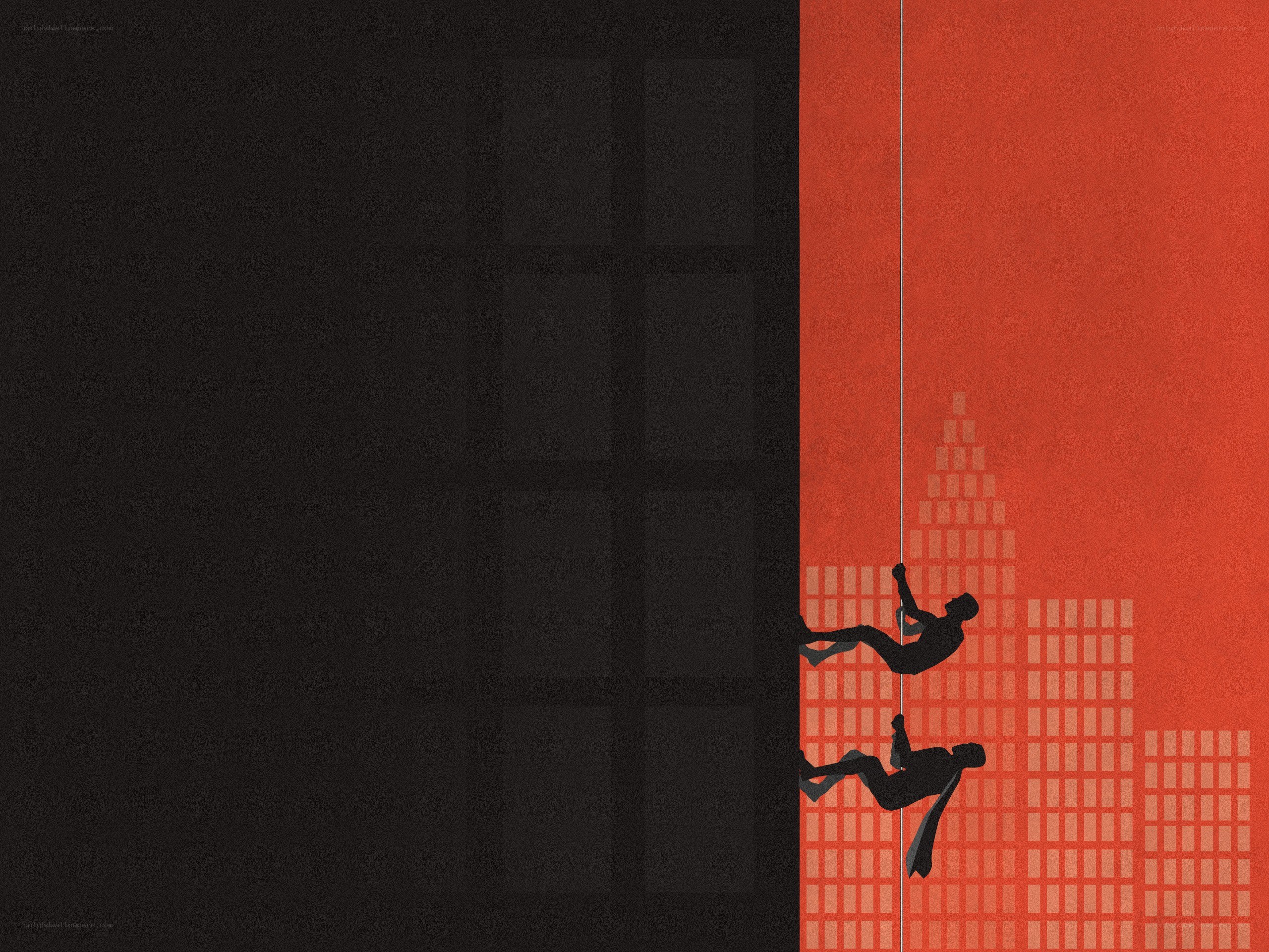 Silhouettes climbing building