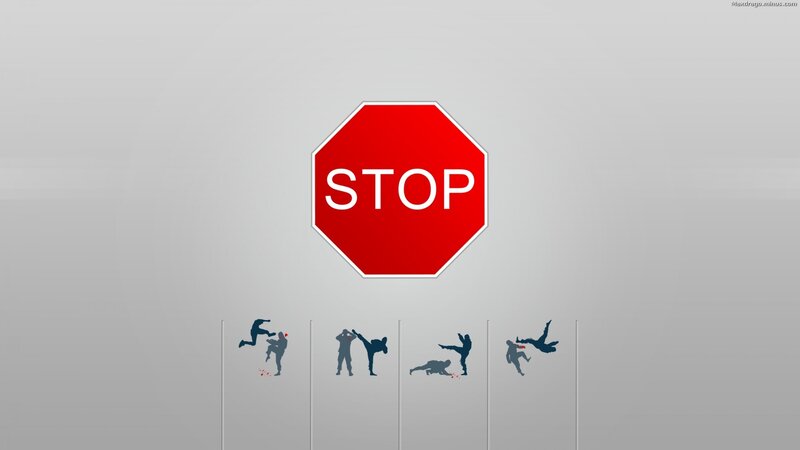 Silhouettes Fighting under Stop Sign