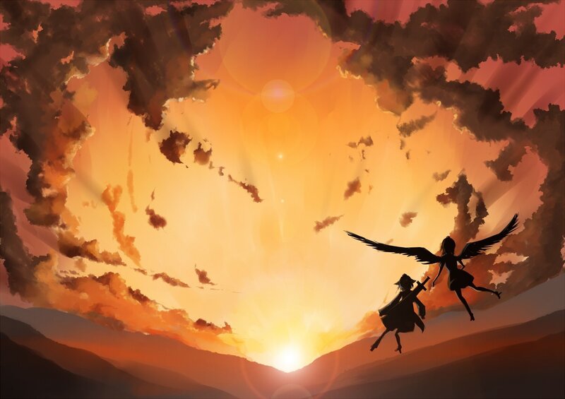 Silhouettes flying at sunset