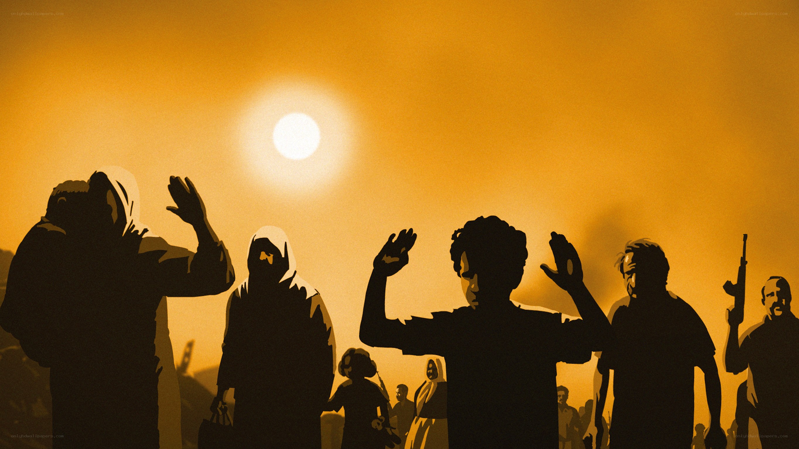 Silhouettes in a desert sunset