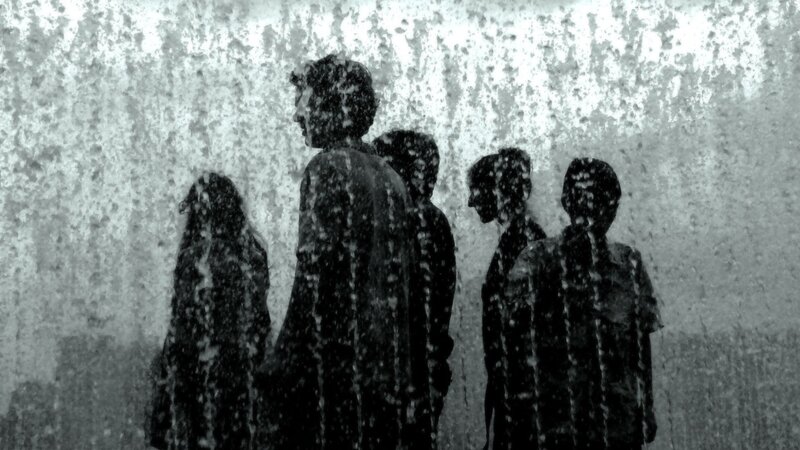 silhouettes in a rainstorm