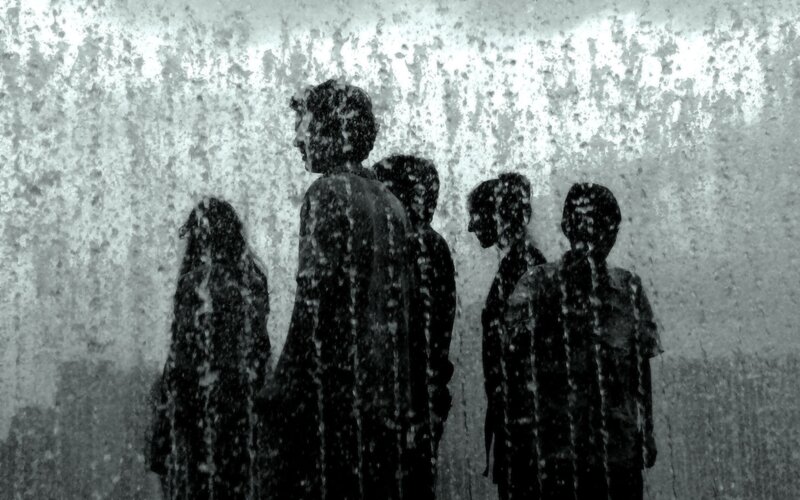 silhouettes in a water curtain