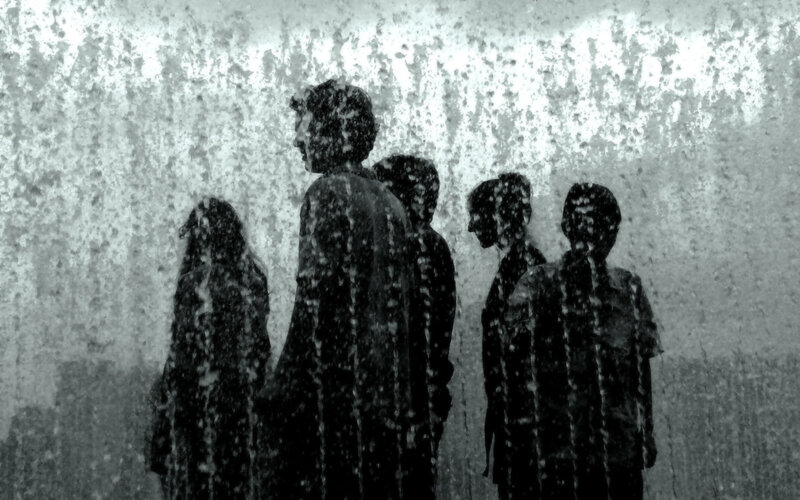 silhouettes in a water curtain