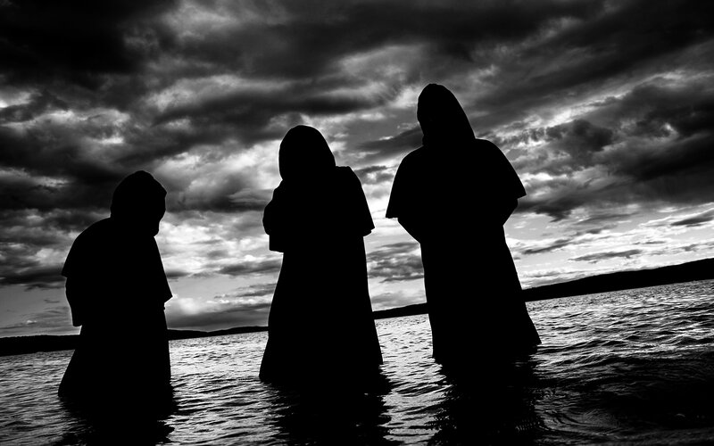 Silhouettes in the water
