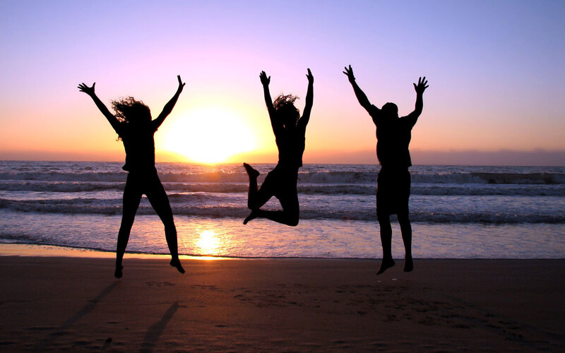 Silhouettes Jumping on Beach — Purple, Joyful