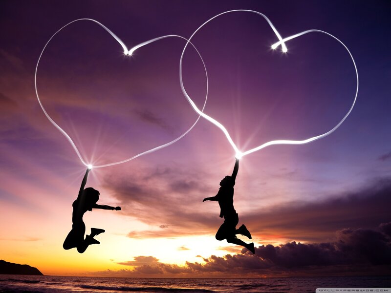 Silhouettes Jumping on Beach — Purple