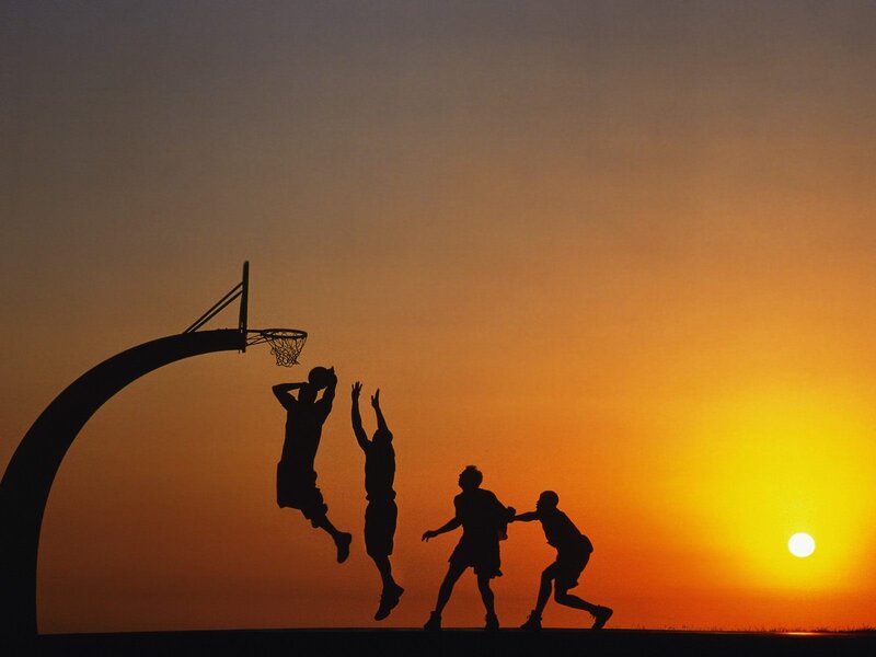 Silhouettes of basketball players