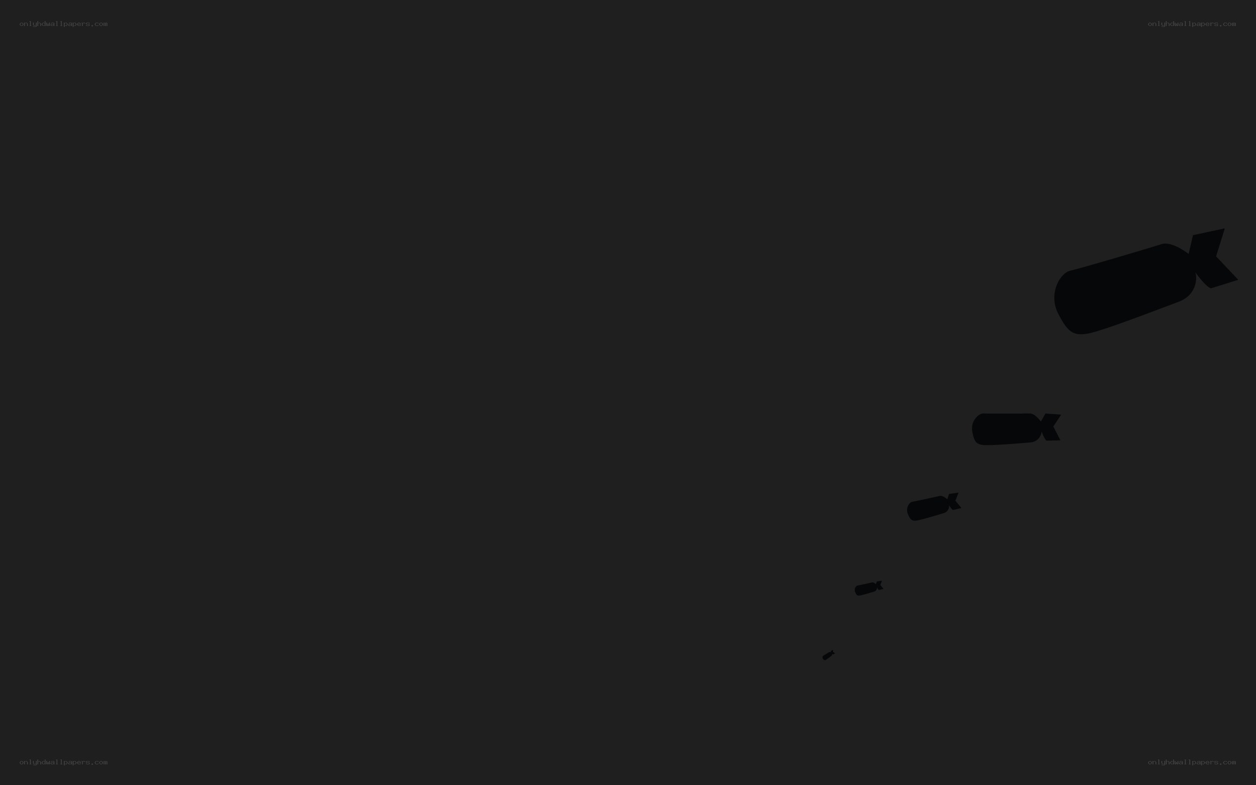 silhouettes of bombs falling