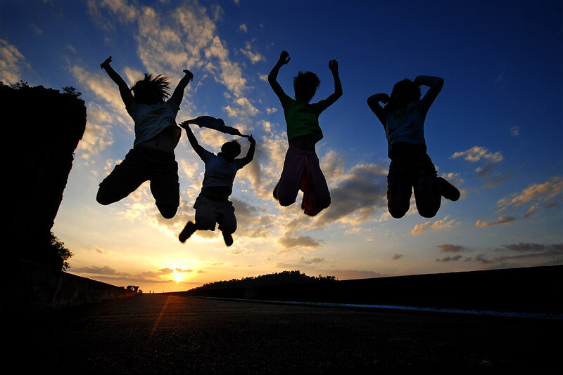 Silhouettes of Children Jumping — Blue