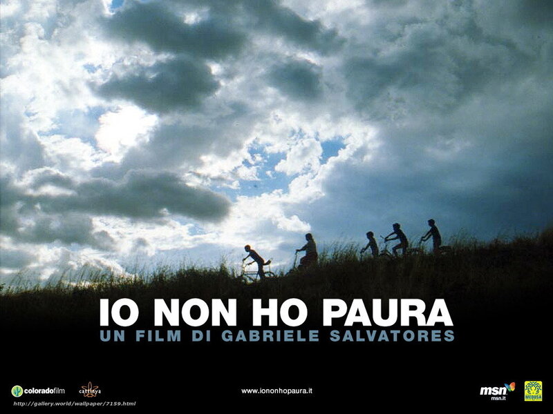 Silhouettes of Children on Bikes