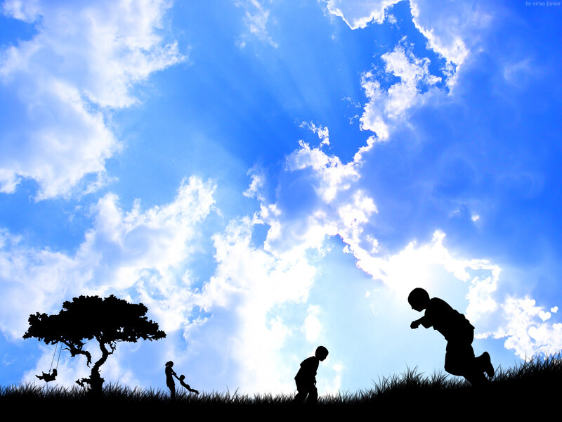 Silhouettes of children playing