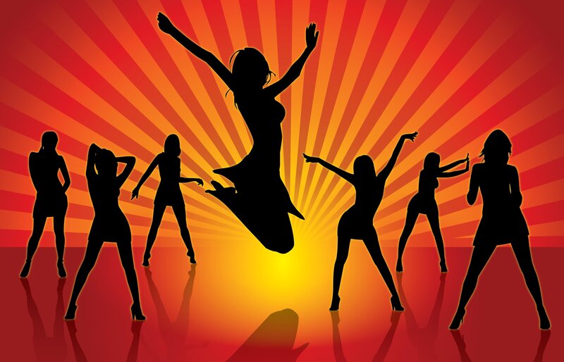 silhouettes of dancers at sunset