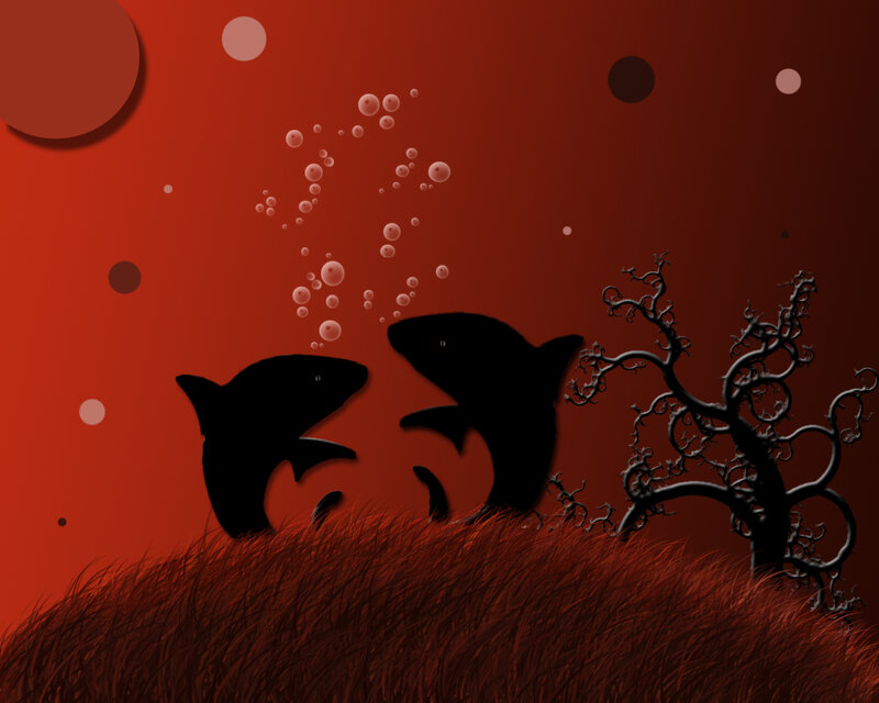 silhouettes of fish in red water
