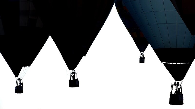 Silhouettes of hot air balloons
