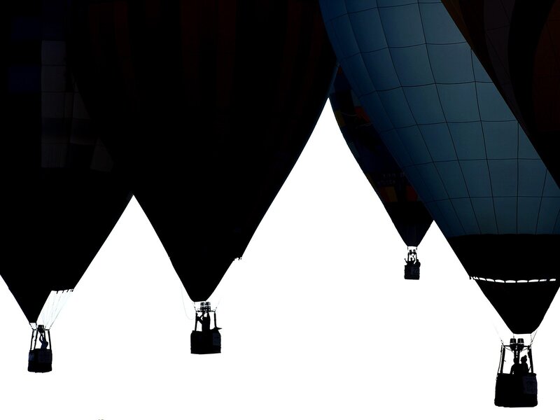 Silhouettes of hot air balloons