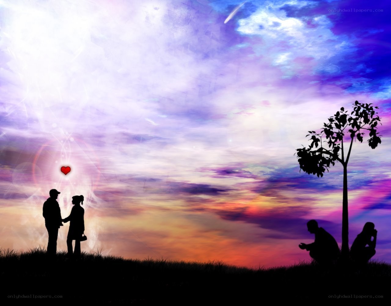Silhouettes of lovers at sunset