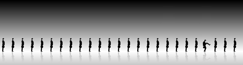 Silhouettes of men in a line