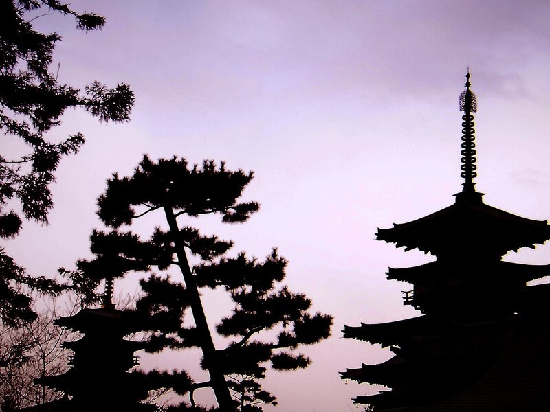 Silhouettes of pagodas at dusk