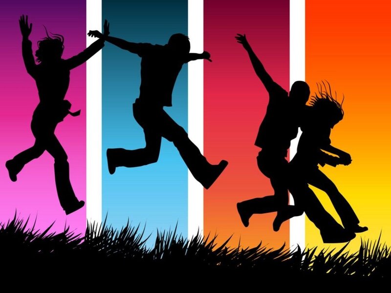 silhouettes of people jumping