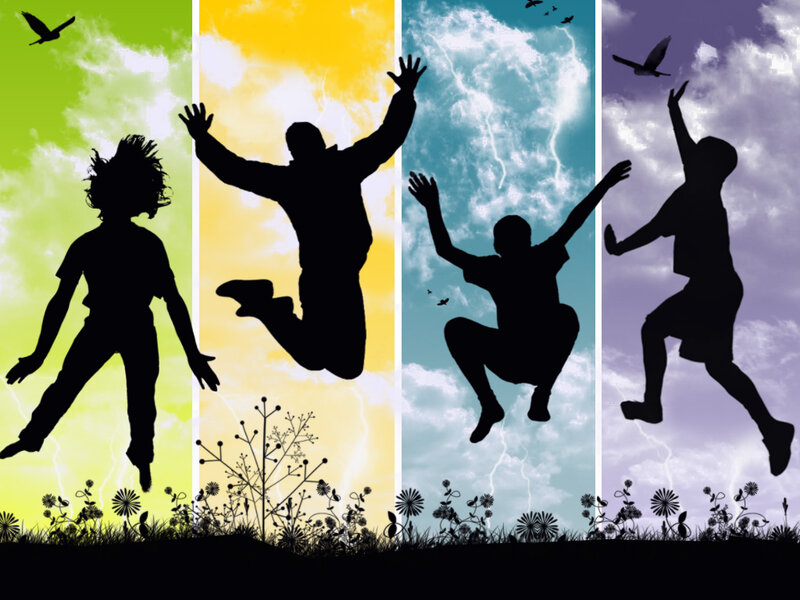 silhouettes of people jumping