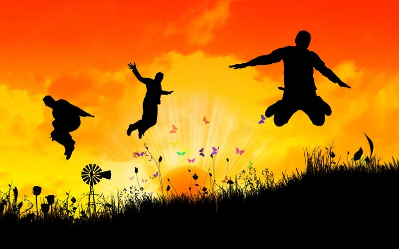 Silhouettes of People Jumping — Orange