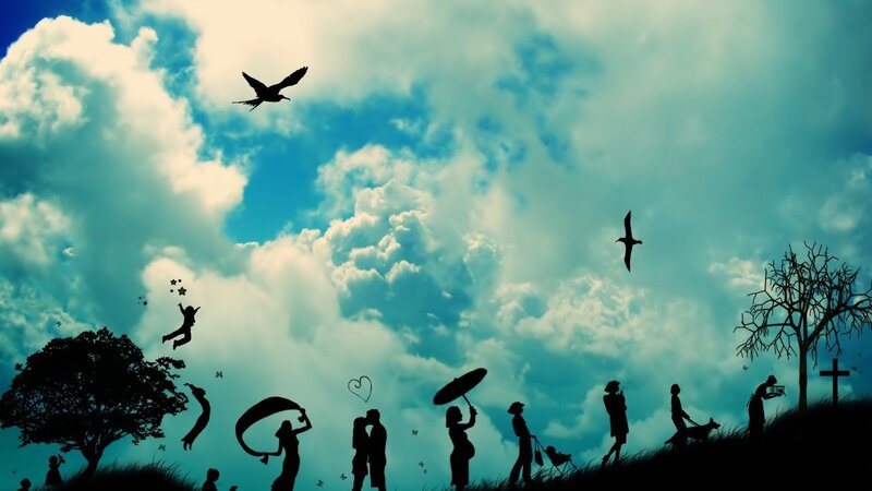 Silhouettes of people under a cloudy sky