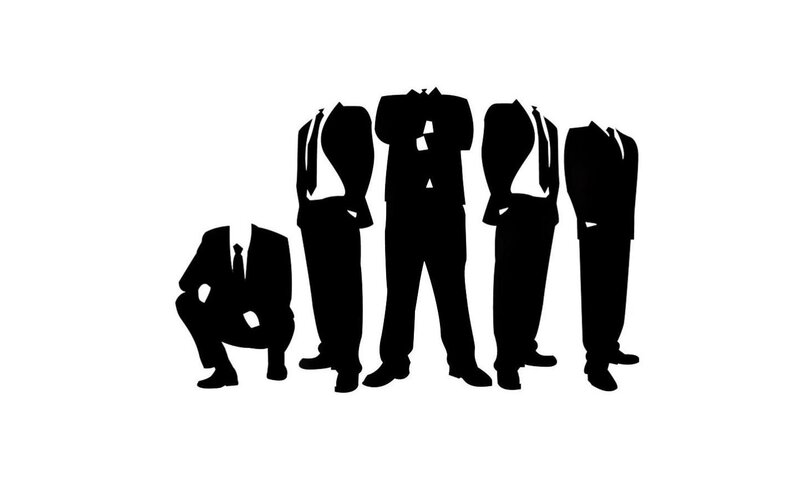 silhouettes of suited figures