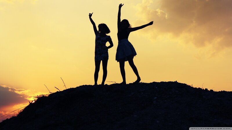 Silhouettes of Two Girls — Yellow, Dramatic