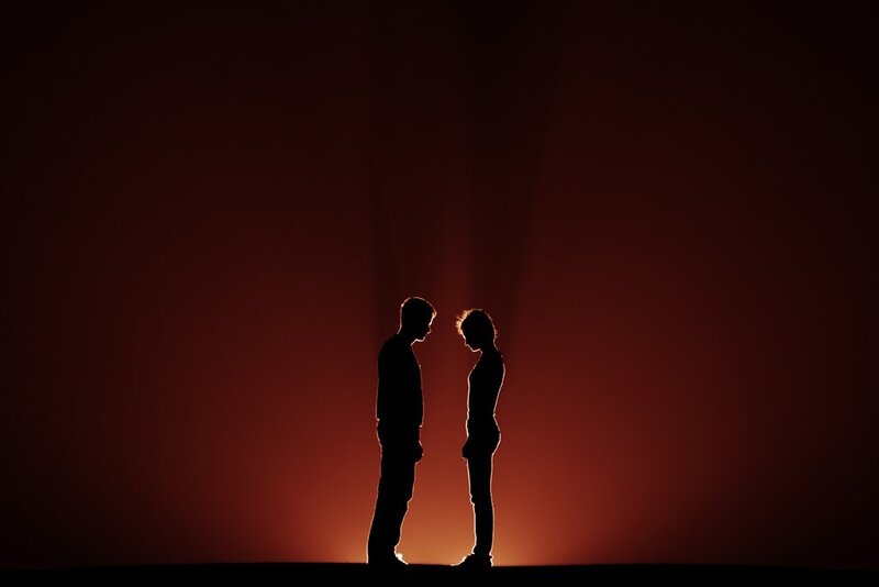 silhouettes of two people