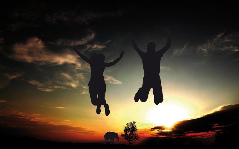 Silhouettes of Two People — Orange