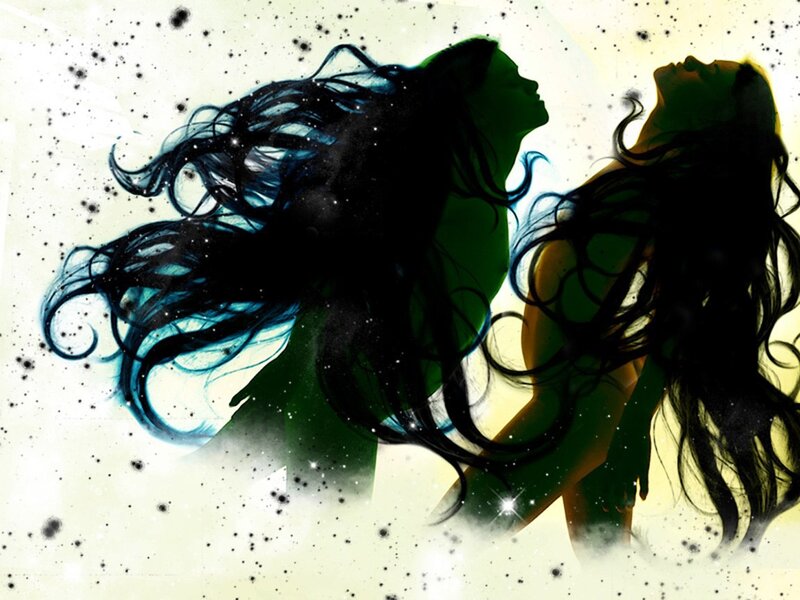 silhouettes of two women with flowing hair
