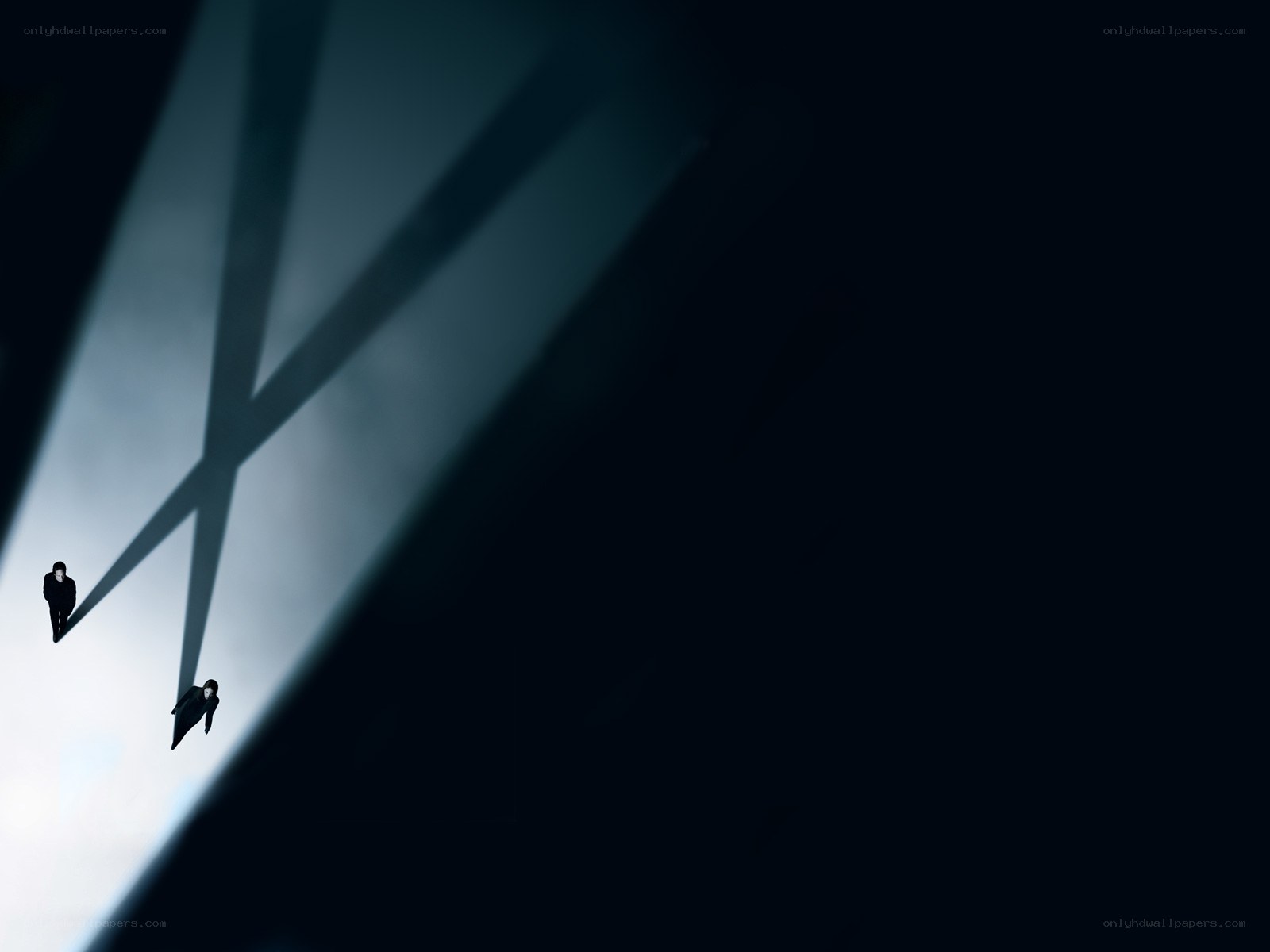 Silhouettes on a bright wall